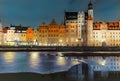 Mariacka Gate and other sights of Gdansk on the bank of the Motlawa, evening view