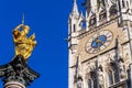 Marian column 1639 or Mariensaule with statue of Virgin Mary on the top and Neues Rathaus, Munich, Germany