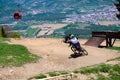 Downhill mountain bikers riding down the trail on Pohorje near Maribor, Slovenia Royalty Free Stock Photo