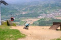 Downhill mountain bikers riding down the trail on Pohorje near Maribor, Slovenia Royalty Free Stock Photo