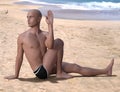 Marichyasana pose bald man right