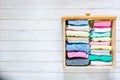 Marie Kondo tyding up method concept - folded clothes