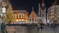 Marienplatz with the old Munich town hall and the Talburg Gate night timelapse, Bavaria, Germany. Royalty Free Stock Photo