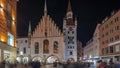 Marienplatz with the old Munich town hall and the Talburg Gate night timelapse hyperlapse, Bavaria, Germany. Royalty Free Stock Photo