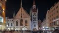 Marienplatz with the old Munich town hall and the Talburg Gate night timelapse hyperlapse, Bavaria, Germany. Royalty Free Stock Photo