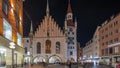 Marienplatz with the old Munich town hall and the Talburg Gate night timelapse hyperlapse, Bavaria, Germany. Royalty Free Stock Photo