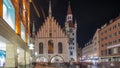 Marienplatz with the old Munich town hall and the Talburg Gate night timelapse hyperlapse, Bavaria, Germany. Royalty Free Stock Photo