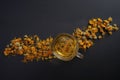 Marigold Calendula officinalis  dried flowers and a transparent cup of tea Royalty Free Stock Photo