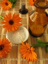 Marigold flowers and homeopathic pills