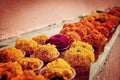 Marigold and rose for offering respect at Mahabodhi Temple. Bodh Gaya, India.