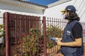 Census taker at the door of a house to collect data from the 2022 census in MarÃÂ­lia city