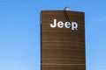 Jeep logo at a dealership. The subsidiaries of FCA are Chrysler, Dodge, Jeep, and Ram