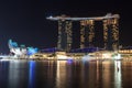 Marina Bay Sands hotel at night with light and laser show in Singapore Royalty Free Stock Photo