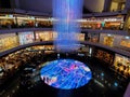Marina Bay, Singapore - February 19, 2023 - The bright interactive display and luxury stores inside the Shoppes
