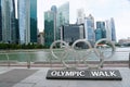 Marina Bay, Singapore - February 19, 2023 - The Olympic Walk sign with the background of the city during the day