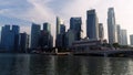 Marina Bay, Singapore May, 2018: View of business district and The Merlion Park. Moving clouds with Singapore city