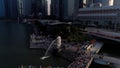 Marina Bay, Singapore May, 2018: View of business district and The Merlion Park. Moving clouds with Singapore city