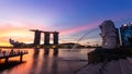 MARINA BAY , SINGAPORE - OCTOBER 15, 2022 : Merlion and marina bay sands with twilight time in the morning . Iconic building