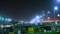 Marina Beach Night View, people walking and tuk tuks parking with street light