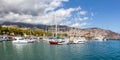 Marina with boats in Funchal panorama on Madeira island in Portugal