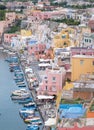 Marina Corricella, Italy, fishing village on the island of Procida with pastel coloured houses tumbling down the cliff to the se Royalty Free Stock Photo