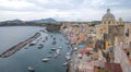 Marina Corricella, Italy, fishing village on the island of Procida with pastel coloured houses tumbling down the cliff to the se Royalty Free Stock Photo