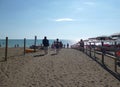 Marina di Bibbona, Livorno. Road leading to the beach, people