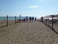 Marina di Bibbona, Livorno. Road leading to the beach, people