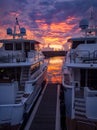 Marina Dock With Too Large Luxury Boats At Dusk