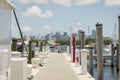Marina docks with boxes on the side at the bay in Miami, Florida