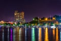 A marina and Federal Hill at night at the Inner Harbor in Baltimore, Maryland. Royalty Free Stock Photo