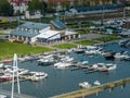 Marina in Gizycko, Poland, Niegocin lake - drone aerial closeup photo of sailboats and bridges