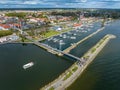 Marina in Gizycko, Poland, Niegocin lake - drone aerial photo of sailboats and bridges