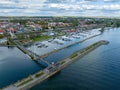 Marina in Gizycko, Poland, Niegocin lake - drone aerial photo of sailboats and bridges