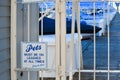 Marina with a Pets on Leashes sign on gate Royalty Free Stock Photo