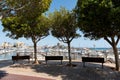 Marina of Portixol with empty benchs in the foreground, Mallorca, Spain