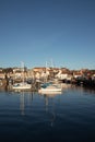 Marina Reflections - Sailing Yachts Moored in Coastal Village Harbour