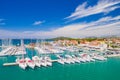 Marina with sailboats on beautiful blue Adriatic seascape, town of Pirovac in Croatia