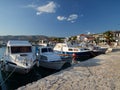 A marina in the seaside town of Okrug Gornji, Croatia, overlooking the mountains Royalty Free Stock Photo