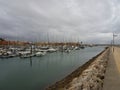 Marina with several boats and sailboats moored. Harbor in PortimÃ£o, Portugal. Royalty Free Stock Photo