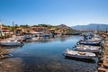 Marina with small motorized boats at the Molyvos harbor of Mithymna Lesbos. Royalty Free Stock Photo