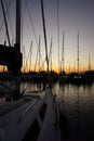 Marina with sun set. Pleasure boating boats and sailing yachts in the harbor. Royalty Free Stock Photo