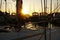 Marina with sun set. Pleasure boating boats and sailing yachts in the harbor. Royalty Free Stock Photo