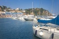 Marina with yachts in Blanes, Costa Brava, Spain. Sail boats in sea port. Sailboat harbor, many beautiful moored sail yachts Royalty Free Stock Photo