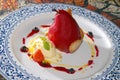 Marinaded pear with ice-cream