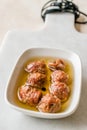 Marinated Canned Anchovy Fillet in Bowl / Anchovies served with Black Pepper on Marble Board