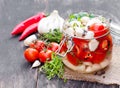 Marinated cherry tomato with garlic and mixed chillies and herb