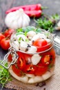 Marinated cherry tomato with garlic and mixed chillies and herb