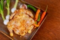 A marinated chicken cooking in a slow cooker. Royalty Free Stock Photo