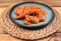 Marinated chicken wings on a plate . Raw chicken wings Royalty Free Stock Photo